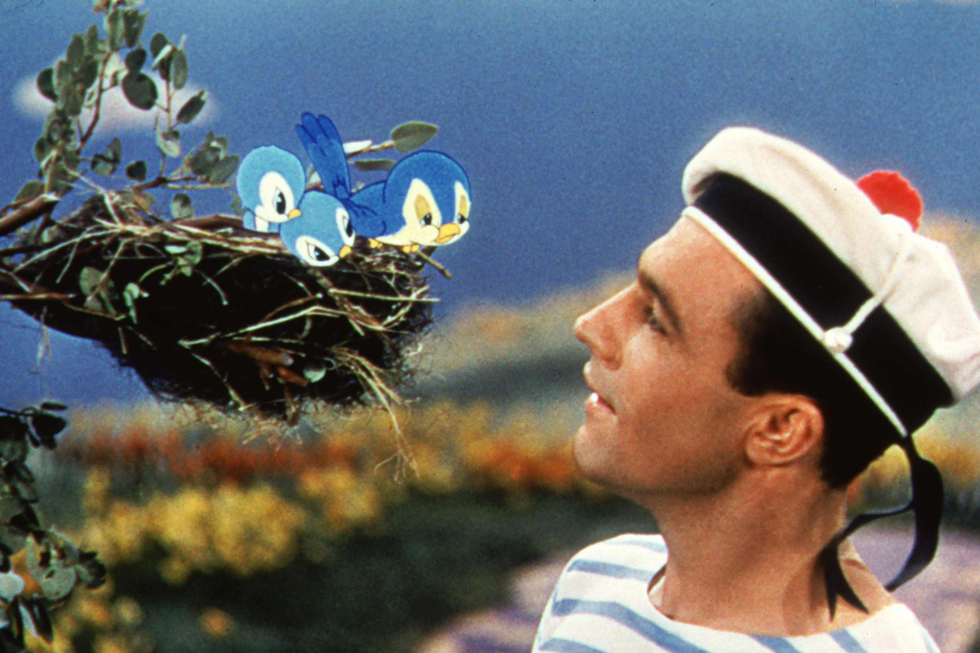 Iconic MGM musical filmmaking during the 1945 Technicolor era Gene Kelly performing in a classic Hollywood musical sequence